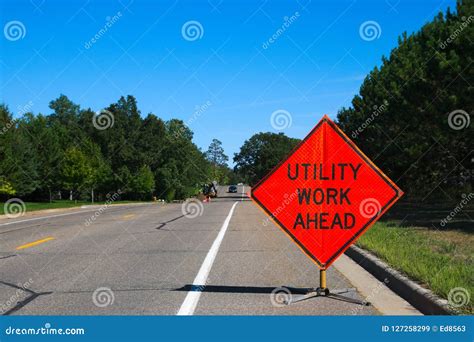 Utility Work Ahead Sign with Service Vehicle on Street Stock Image - Image of outdoors, caution ...