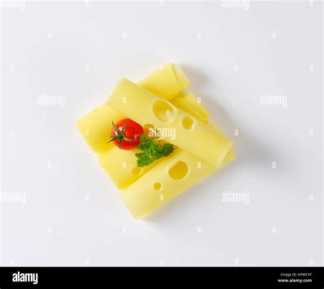 Swiss cheese slices Stock Photo - Alamy