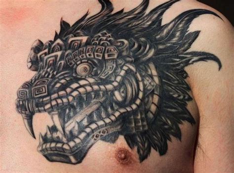 Head of feathered serpent quetzalcoatl aztec tattoo on chest for men - Tattooimages.biz