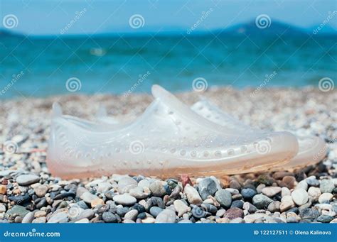 Water Shoes on Beach. Holiday Concept Stock Image - Image of rocky, shoe: 122127511