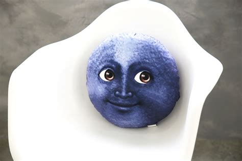 Blue moon emoji pillow. His face is 3D printed! So vivid