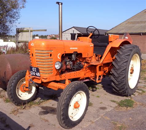 File:Orange Belarus tractor.jpg