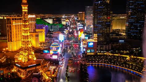 Flying Over Downtown Las Vegas At Night With Stock Footage SBV-328700501 - Storyblocks