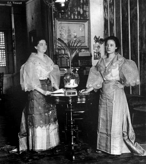 Young Spanish mestizo women in native dress inside a pleasant Filipino home, Ermita, Manila ...