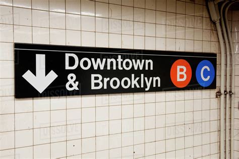 Sign in subway station, Manhattan, New York City, New York, USA - Stock Photo - Dissolve