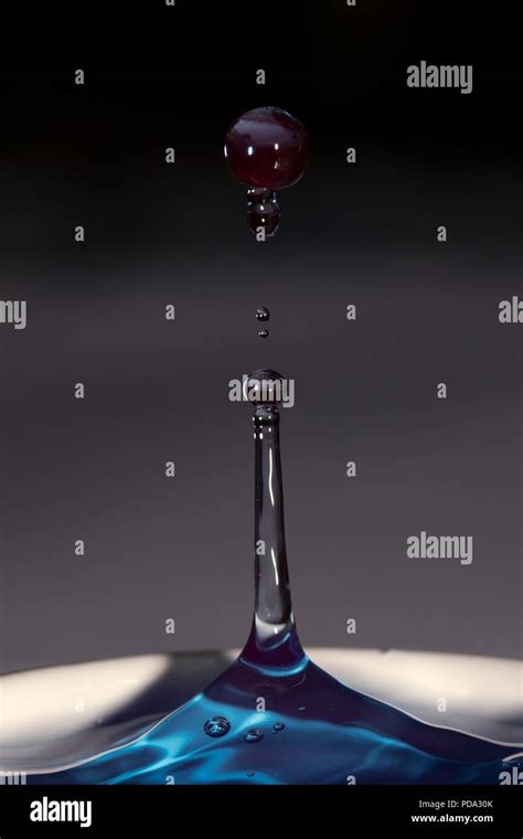 Waterdrop photography creating splash art Stock Photo - Alamy