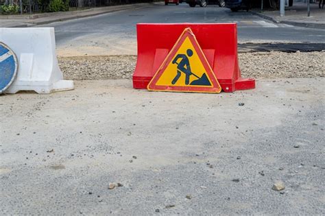 Premium Photo | Road repair caution work in progress sign