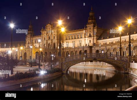 night view of Plaza de Espana with bridges. Seville, Spain Stock Photo - Alamy