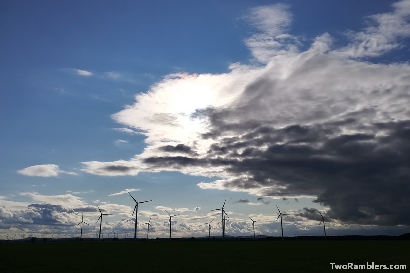 threatening clouds over windmills