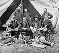 The staff of Gen. Fitz-John Porter: Lts. William G. Jones and George A. Custer reclining