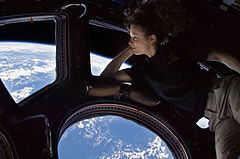 Second place: Self portrait of Tracy Caldwell Dyson in the Cupola module of the International Space Station observing the Earth below during Expedition 24. (POTD) Tracy Caldwell Dyson (NASA)