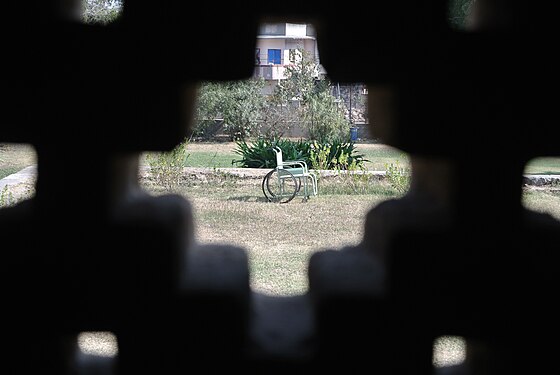 Wheel chair as seen from the monument carving