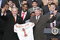 George W. Bush and Mack Brown give the Hook 'em Horns in front of the White House after Texas won the 2005 National Championship in football