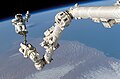 Steve Robinson on Canadarm2 during EVA-3