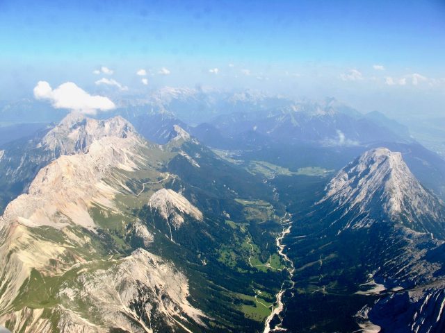 plane-window-view-tyrol-alps