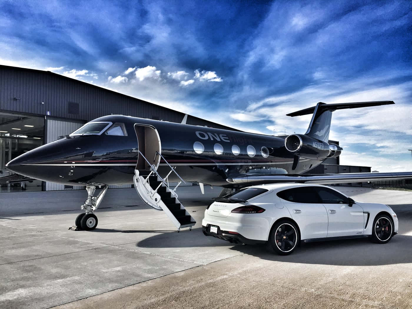 Download Private Jet With Car Wallpaper | Wallpapers.com