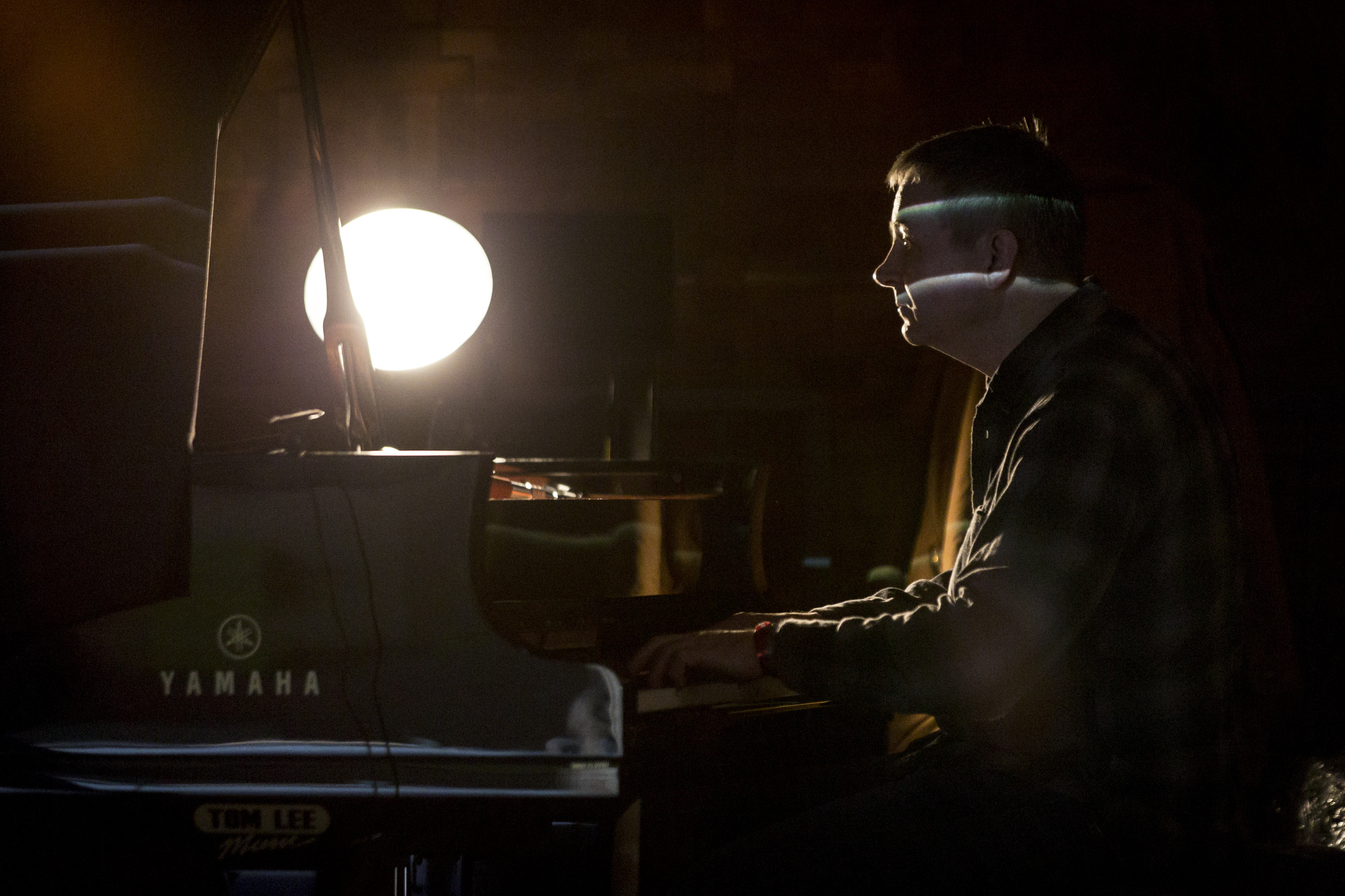 Backstage at TED2015, our team works in darkness to make sure that talks look and sound their best. Photo: Bret Hartman/TED