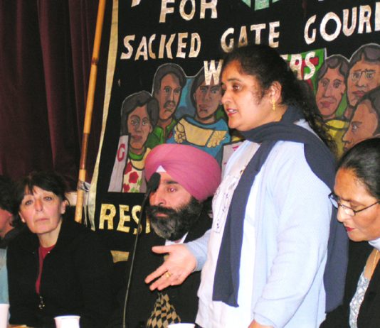 Gate Gourmet locked-out worker PARMJIT BAINS , flanked by HARBINDER SINGH and LAKHINDER SARAN  addressing the News Line- locked-out Gate Gourmet workers Conference in central London last Sunday