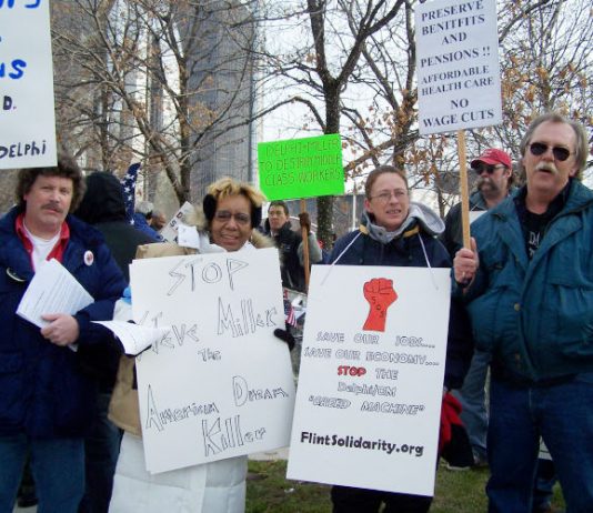 UAW car workers fighting to defend their jobs and pensions lobbying the Detroit motor show