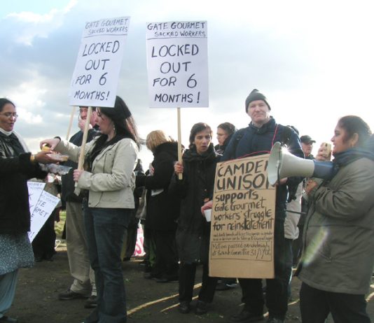 William Westwell (second from right) with a placard showing support for the locked-out workers from his Camden UNISON branch