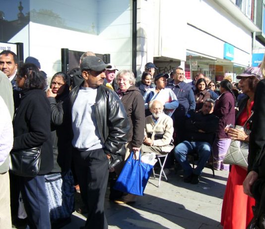 Section of the hundreds of depositors who were queuing outside Northern Rock bank in Harrow yesterday