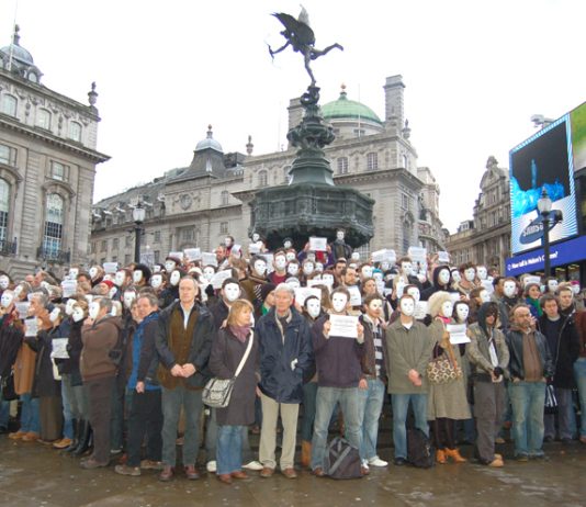 A section of the 500 actors demonstrating their opposition to the Art Council cuts in funding at Piccadilly Circus on Tuesday