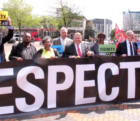 Teamsters union leader James Hoffa (centre) lobbies the National Express shareholders meeting in Birmingham along with Unite leader McCluskey