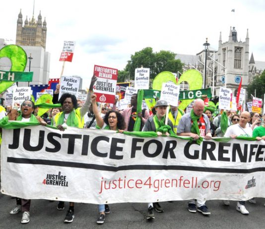 The front of Saturday’s march passes Parliament