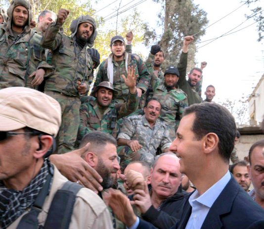 Syrian troops greet President Assad after the victory over the terrorists in Eastern Ghouta