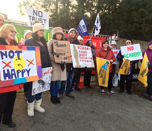 Striking NEU members on the picket line at The Village School in Kingsbury yesterday morning