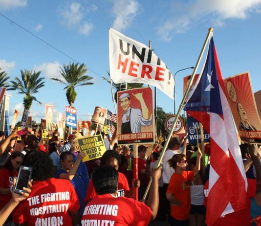 Unite Here Disney workers demonstrate in central Florida on Monday against the company withholding their $1,000 bonuses