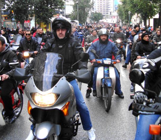 Greek transport workers demonstration led by a cavalcade of 200 motorcyclists in Athens