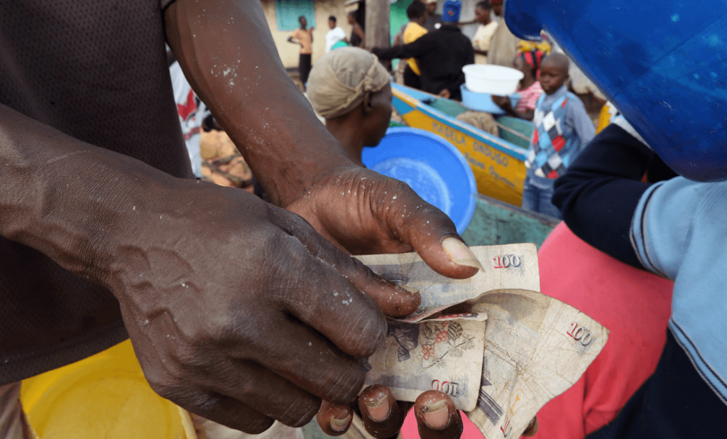 Person counting money