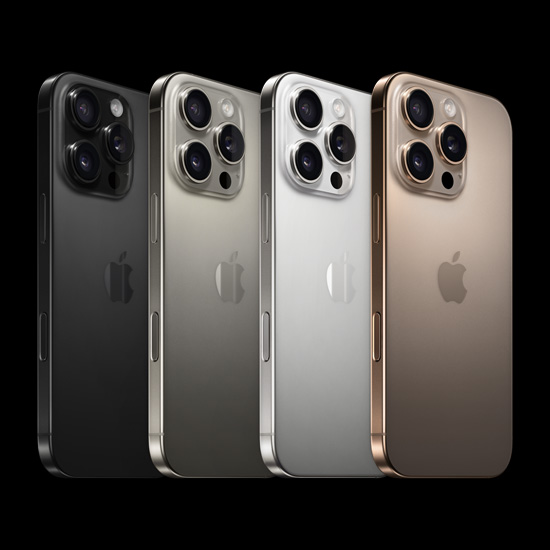 Back view of iPhone 16 Pro, all four finishes, Black Titanium, Natural Titanium, White Titanium, and Desert Titanium.