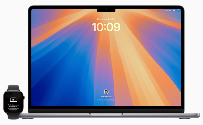 Vista frontale di un MacBook Pro che viene sbloccato con un Apple Watch.