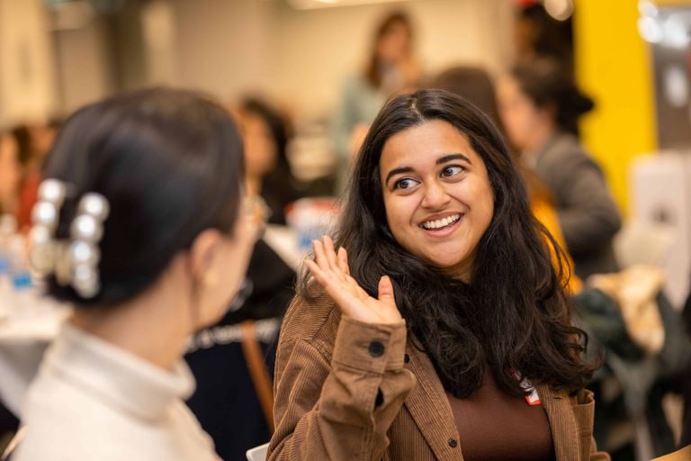 Students smiling and talking