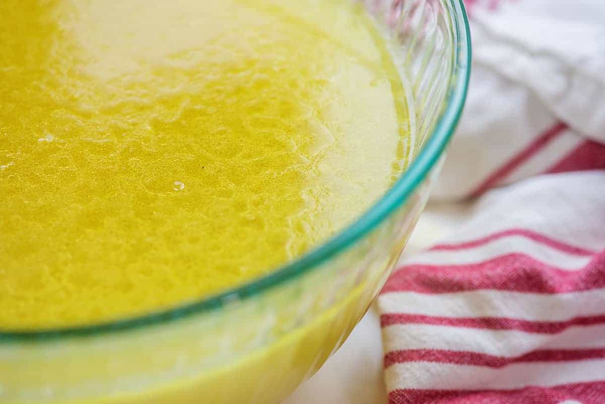 chicken broth in glass bowl.