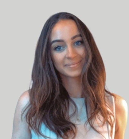 headshot of woman on grey background