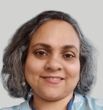 Headshot of woman on grey background