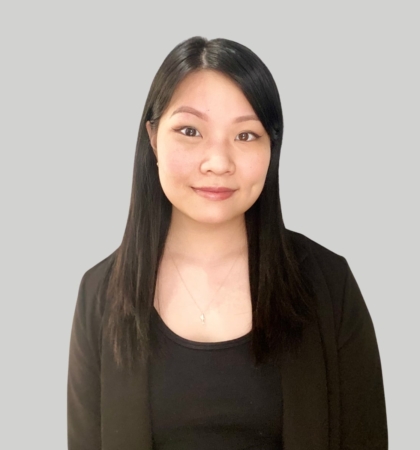 Headshot of woman on grey background