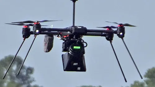 Image of a drone equipped with loudspeaker