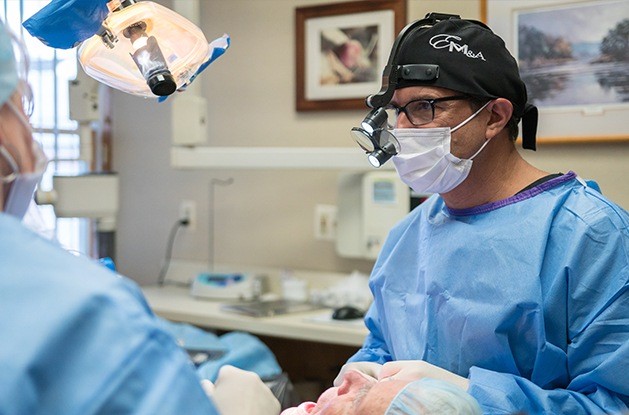 dentist placing crowns