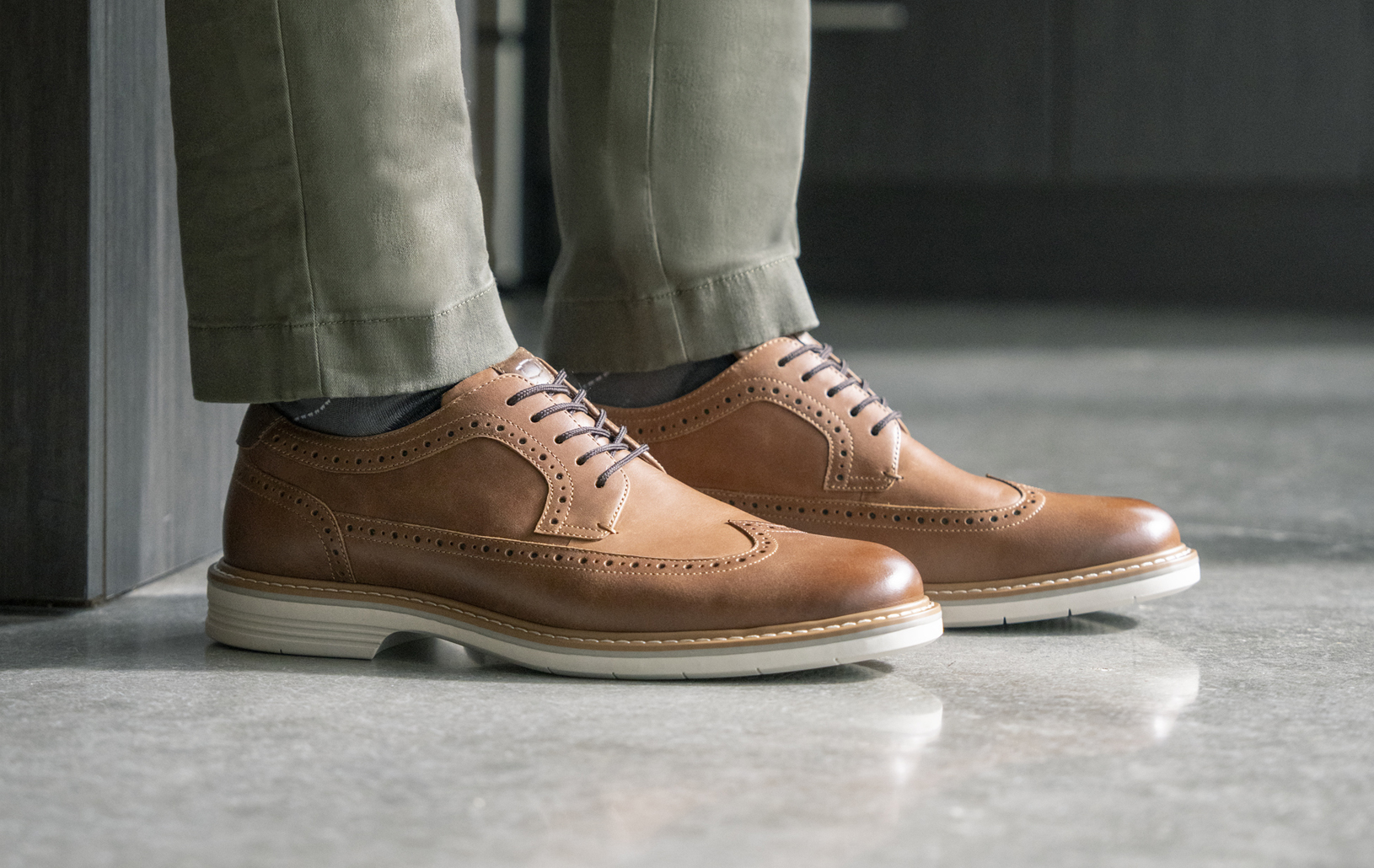 Image features the Norwalk Wingtip in Cognac.