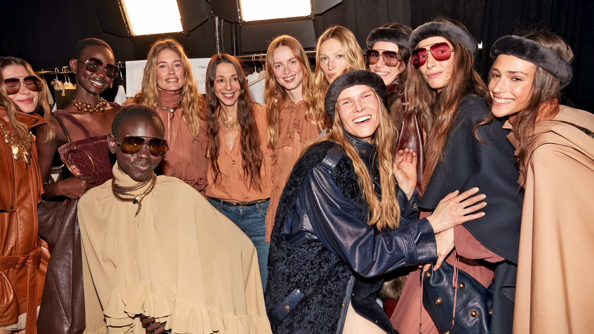 Chemena Kamali (back row, third from left) and models backstage at Chloé AW24