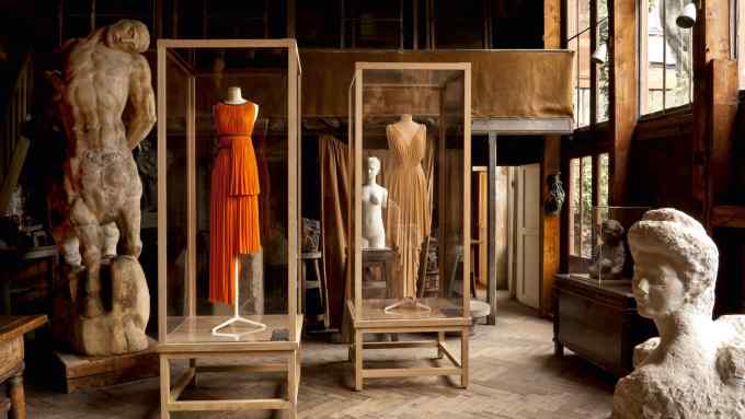 House of Grès silk jersey SS77 evening dress (left), and a silk jersey evening dress, c1981-86, in Madame Grès: Couture at Work installation at Musée Bourdelle