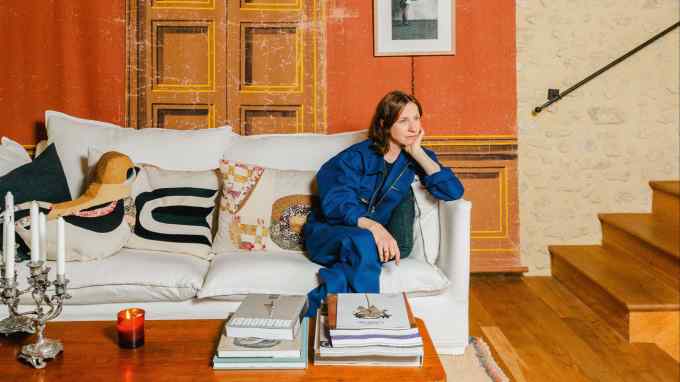 Gabrielle Greiss at home in Origny-le-Butin, Normandy. The theatre backdrop is from Maison Close, an antique shop in nearby Bellême