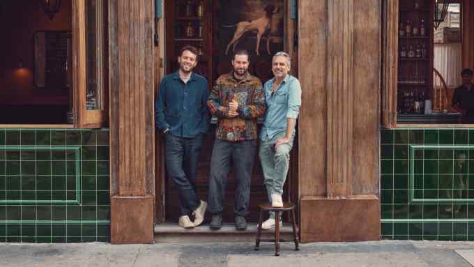 James Gummer, Philip Winser and Olivier van Themsche of Public House outside their west London pub, The Hero