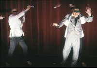 Robin Arthur, John Rowley, and Jerry Killick, with black bands covering their eyes, predicting spectators’ futures.