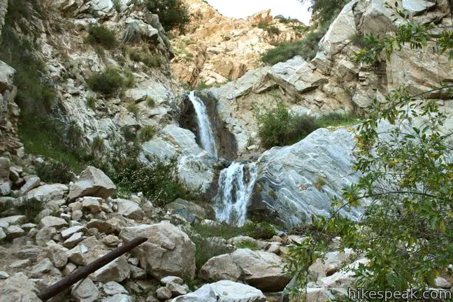 This double waterfall is a short distance up a rustic canyon with historical features.