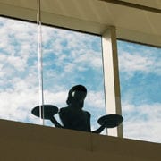 Bird Girl statue in front of window at Telfair Museums Jepson Center